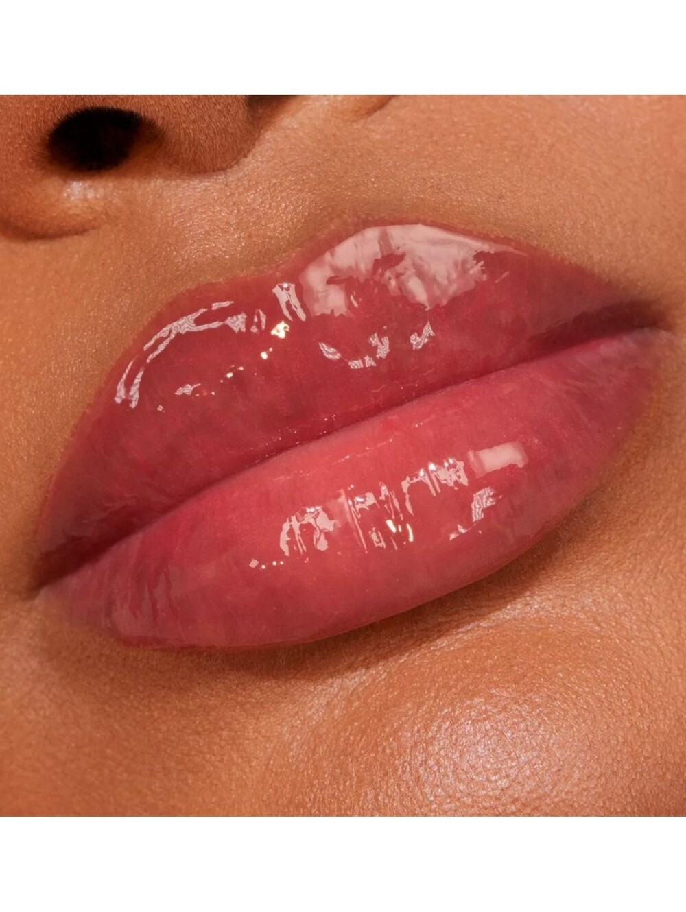 REM BEAUTY ESSENTIAL DRIP GLOSSY BALM.